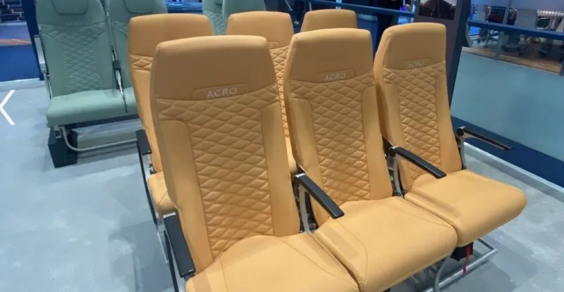 Acro Series 6 seat triples, two in yellow, and behind it one row of green